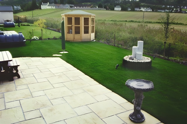 Summer house and lawn feature