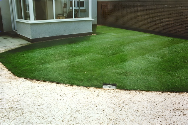 Decorative gravel and lawn installed